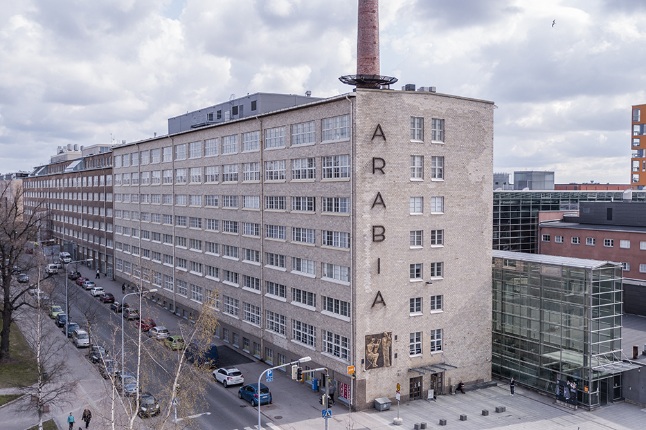 A former ceramics factory building in Arabia, Helsinki with the word "Arabia" on the written on the building's wall.